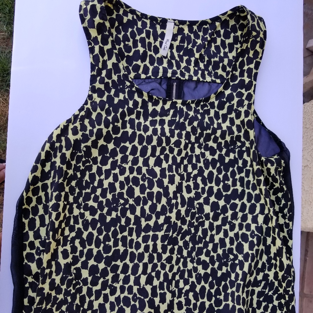 Mind code _ Medium Giraffe print sheer back top.